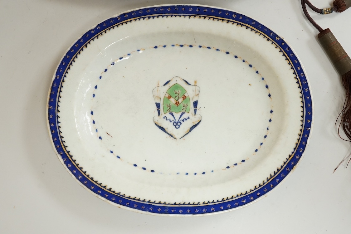 A Chinese embroidered spectacles case and an armorial oval miniature dish